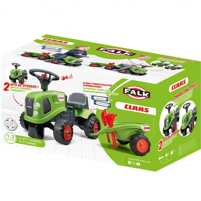 Poganjalec traktor Claas zelen z volanom in prikolico