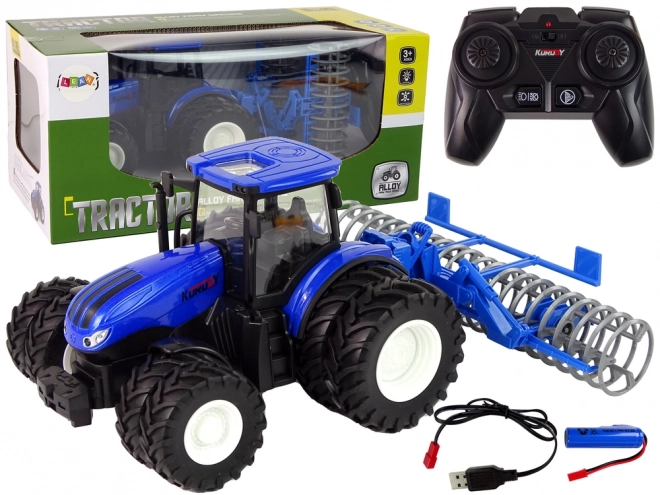 Daljinsko voden traktor 1:24 Blue Disc Aggregate Metal