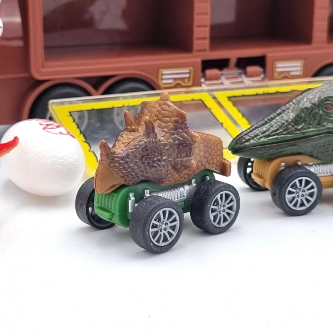 Dinozavrski tovornjak s izstreljevalnikom in avtomobilčki