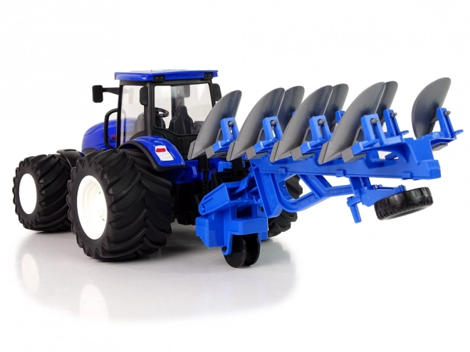 Daljinsko voden traktor 1:24 Modri kovinski plug