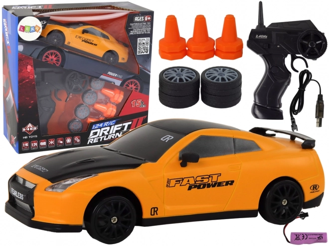 Športni avto R/C 1:24 na daljinsko upravljanje z zamenljivimi kolesi – rumeni