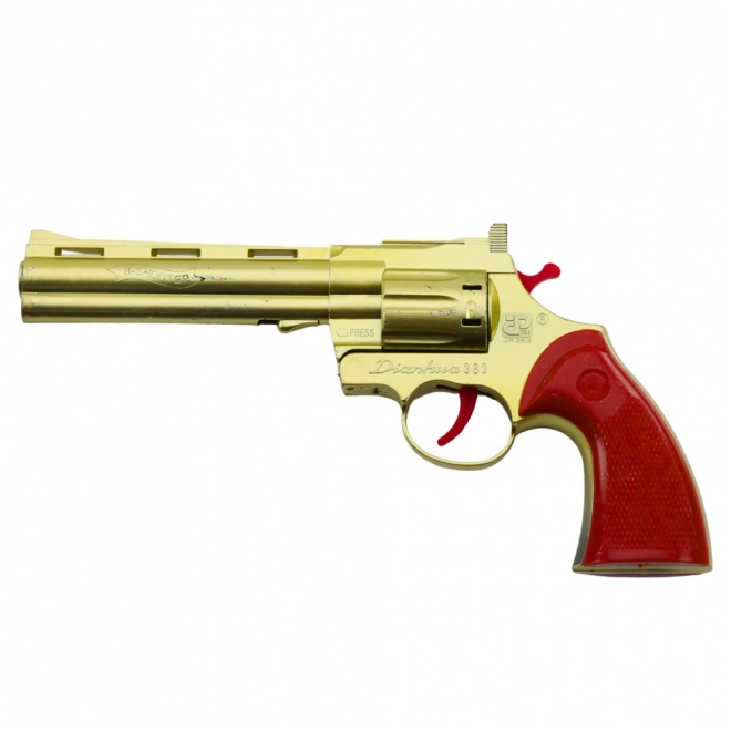 Zlati revolver na kapsle z zvočnim učinkom strela