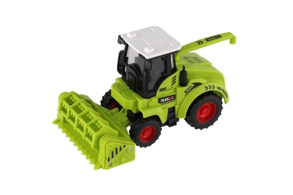 Plastičen kombajn 7x12cm na vztrajnik 2 vrsti