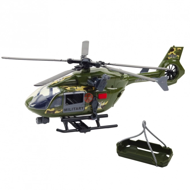 Vojaški helikopter s reflektorji in zvoki