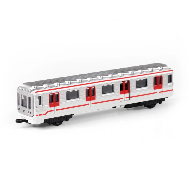 Pragaško metro kov 16 cm na vzmetni pogon v škatlici 19,5x7x6cm