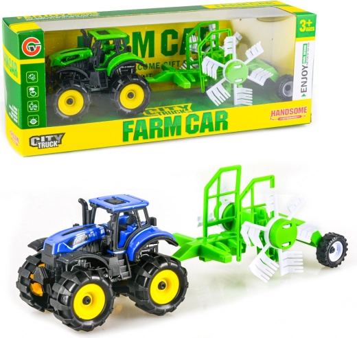 Traktor na vztrajnik s prikolico