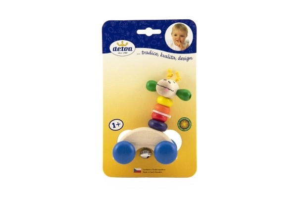 Detoa lesena žirafa na kolesih