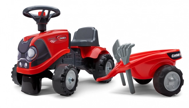 Vozeči traktor Baby Case IH rdeč s prikolico