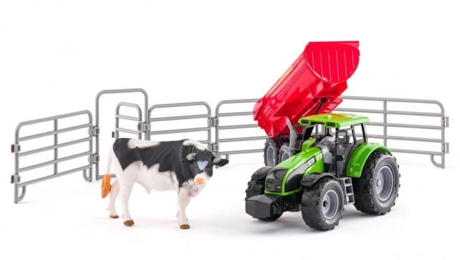 Traktor s prikolico in bikom z vrtom