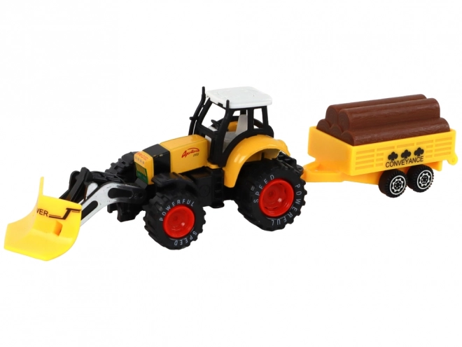 Rumeni traktor s prikolico rdeče