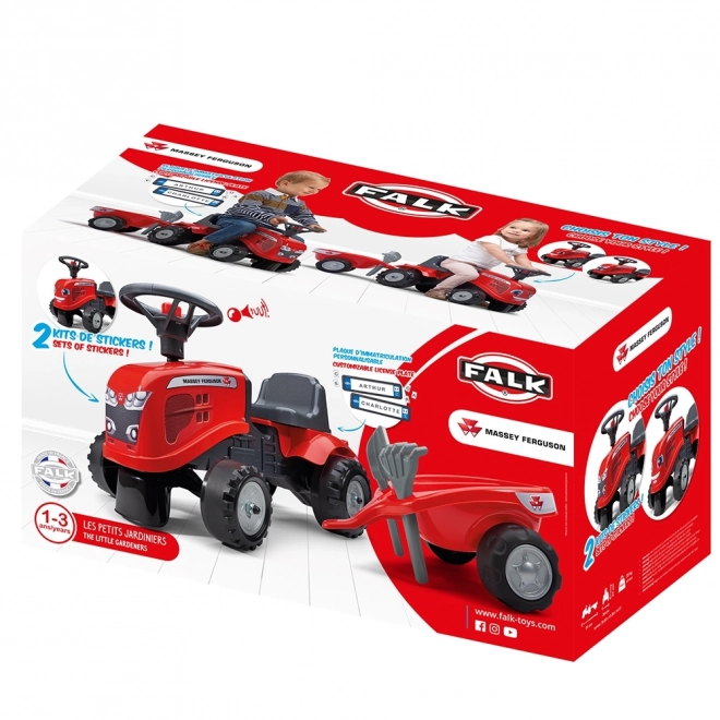 Poganjalec traktor Massey Ferguson rdeč s volanom in prikolico