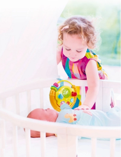 Enostavna pritrditev na posteljico ali voziček