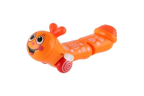 Plastičen plazilec, ki se navije, 13cm, 6 barv, 12 kosov v škatli