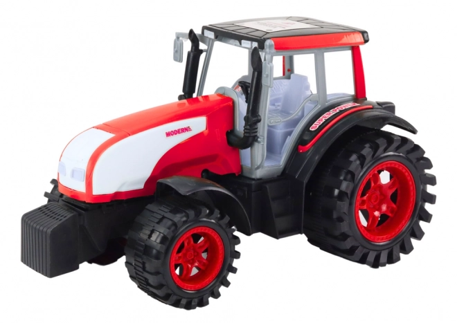 Velik kmetijski traktor s pogonom Rdeč