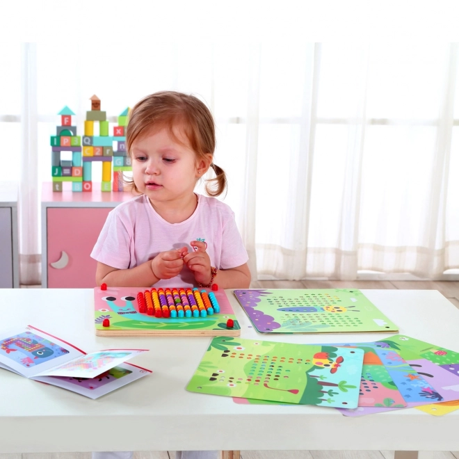 Lesena sestavljanka s kljukicami znamke Tooky Toy
