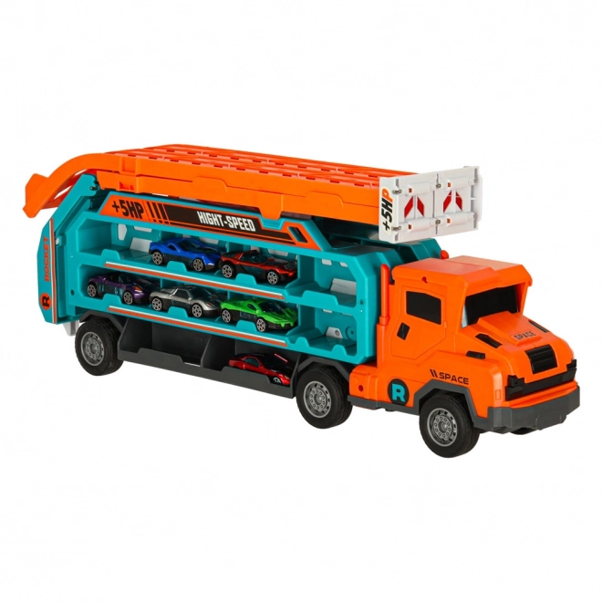 Dirkalna steza s avtovleko in transporterjem 6 delov - oranžna