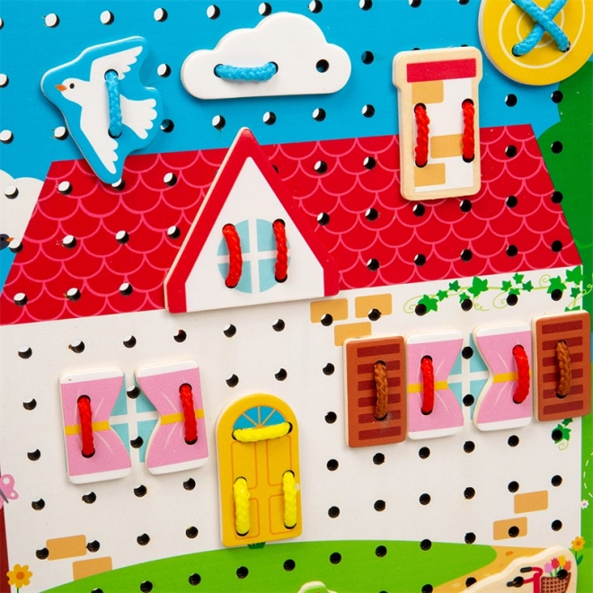 Bigjigs Toys Prepletalna plošča hišica