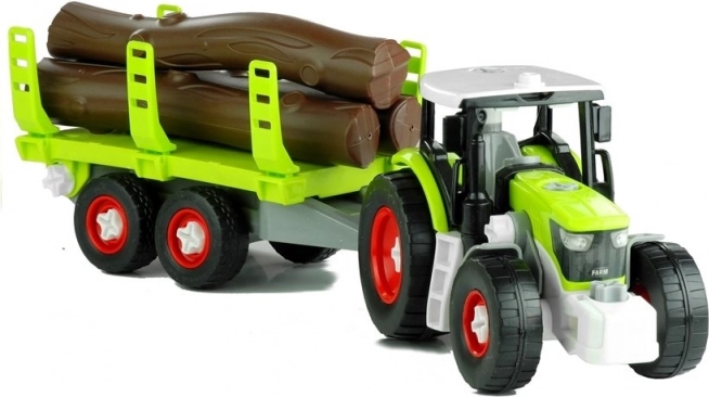 Zložljiv traktor s prikolico za les