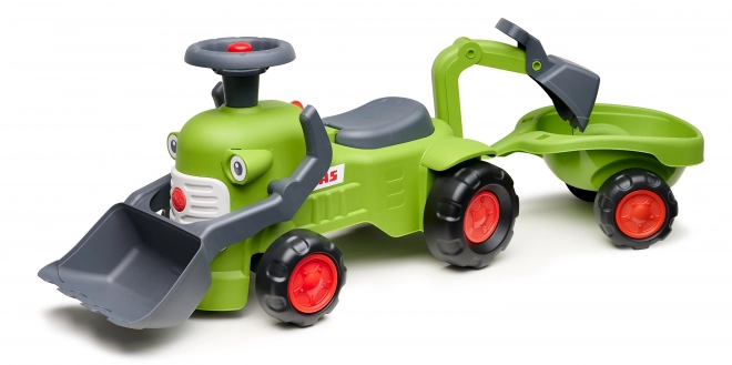 Vozni traktor Claas s prikolico, nakladalnikom in žlico