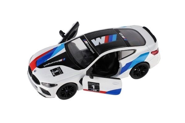 Avto Kinsmart BMW M8 Competition Coupé 1:38 kov/plast 12,5cm 4 barve na povratni pogon 12kom v škatli