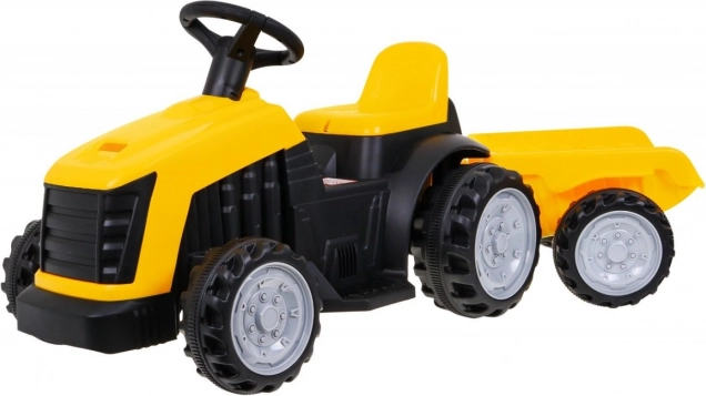 Otroški pedalni traktor s prikolico – rumen