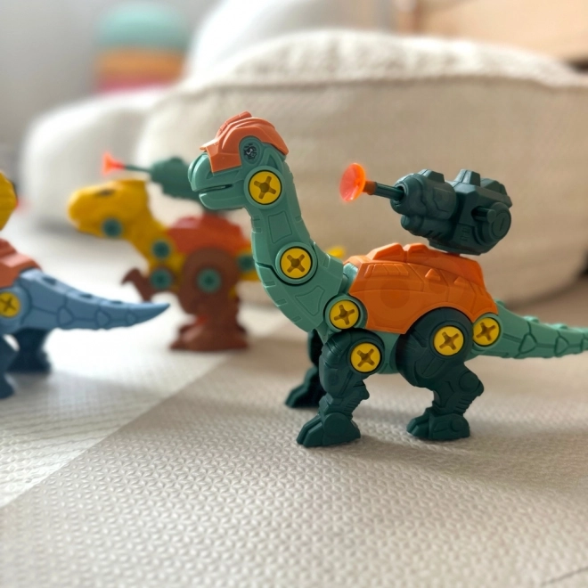 Woopie komplet dinozavri za vijačenje 3 kosi gradbeni komplet s kovčkom in vrtalnikom z izvijačem