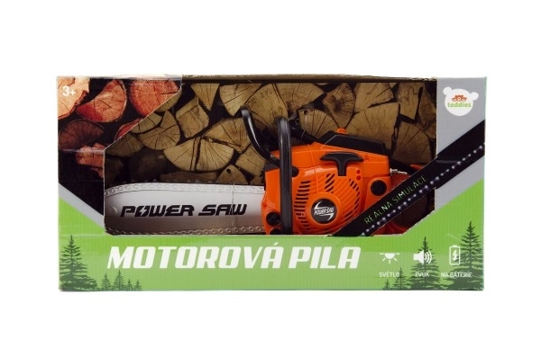 Plastična motorna žaga 40cm na baterije z zvokom v škatli 42x21,5x11cm