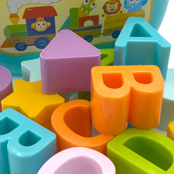 Woopie otroški sorter in kovček z učenjem abecede in oblik