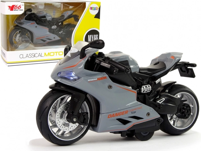 Športni model motornega kolesa 1:12 s pogonom pull-back, zvokom in lučmi