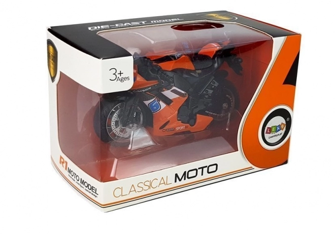 Oranžna igrača motorno kolo z pogonom