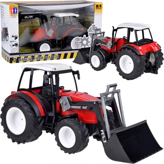 Velik rdeč traktor s premično roko in velikimi kolesi