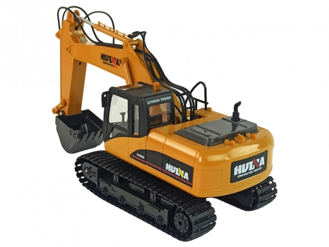 Rumeni RC bager Caterpillar 1:14 na daljinsko upravljanje