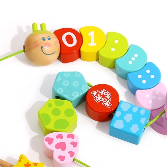 Lesena vezalna gosenica TOOKY TOY