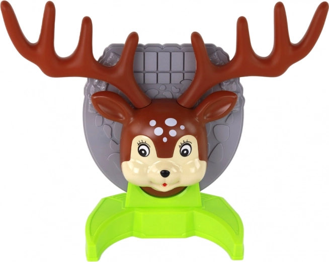 Nasmejan jelenček z velikim rogovjem