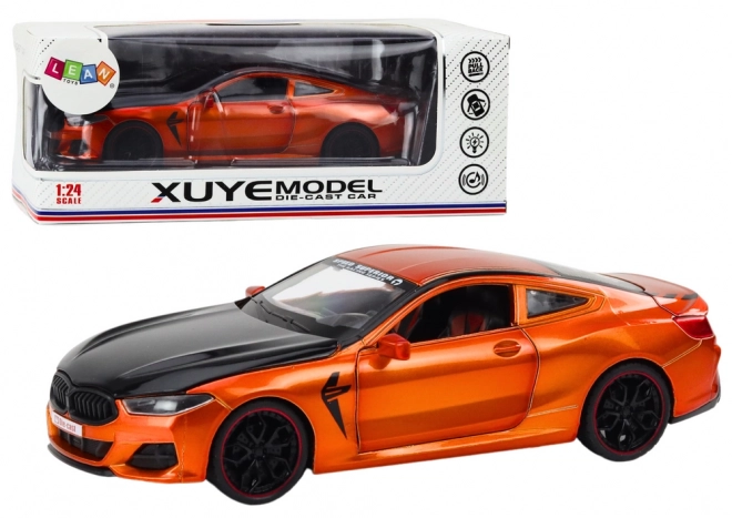 Kovinski športni model s trenjem pogonom in odpiralnimi elementi 1:24 oranžen