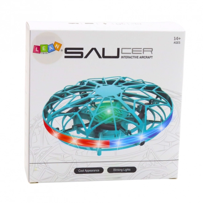 UFO dron lahko upravljan z roko z LED lučkami turkizne barve