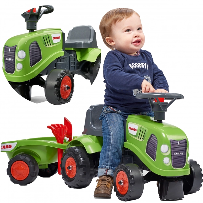 Poganjalec traktor Claas zelen z volanom in prikolico