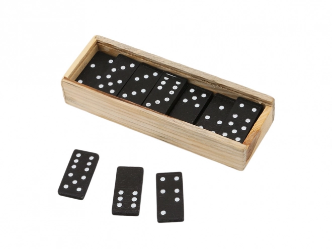 Leseni domino v škatli