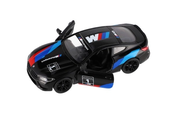 Avto Kinsmart BMW M8 Competition Coupé 1:38 kov/plast 12,5cm 4 barve na povratni pogon 12kom v škatli