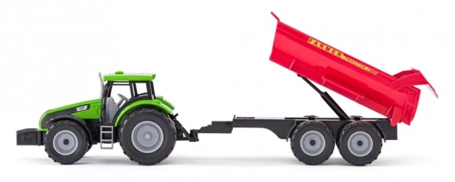 Traktor s prikolico in bikom z vrtom