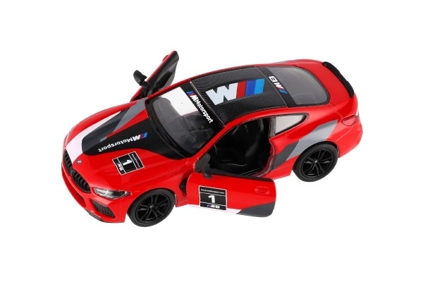 Avto Kinsmart BMW M8 Competition Coupé 1:38 kov/plast 12,5cm 4 barve na povratni pogon 12kom v škatli