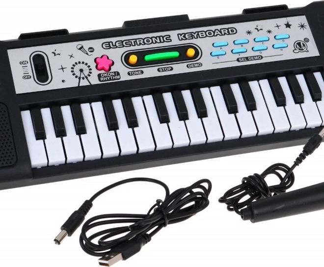 Otroški elektronski klaviaturni instrument s 31 tipkami z mikrofonom in učnim načinom