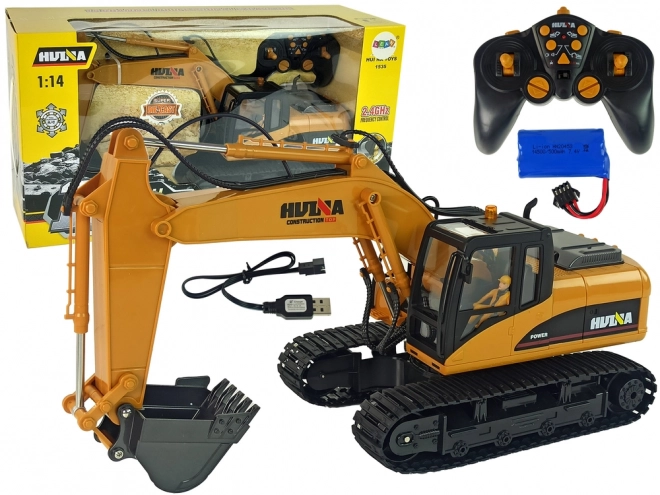Rumeni RC bager Caterpillar 1:14 na daljinsko upravljanje