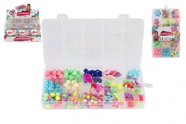 Pisani plastični krogci s trakcem v plastični škatlici 10x17x2cm