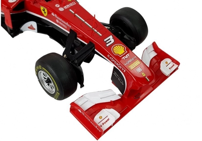 Dirkalni avto Formule 1 Ferrari F138 rdeče 1:12
