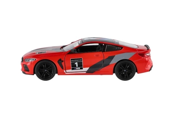 Avto Kinsmart BMW M8 Competition Coupé 1:38 kov/plast 12,5cm 4 barve na povratni pogon 12kom v škatli