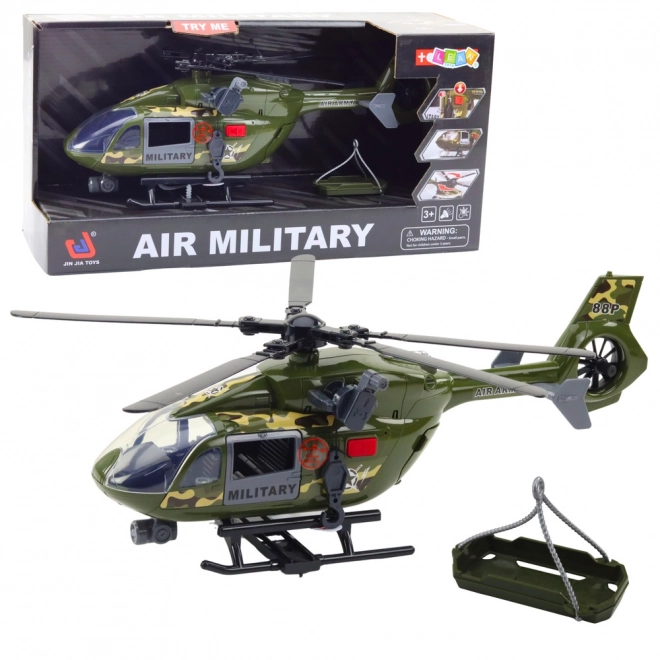 Vojaški helikopter s reflektorji in zvoki