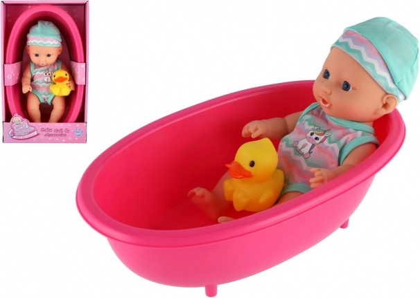 Dojenček punčka v kadi z rumeno račko 22 cm