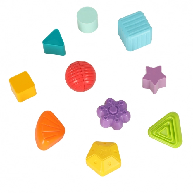 Fleksibilna senzorična kocka s kvadratičnimi puzzle bloki in sortatorjem oblik
