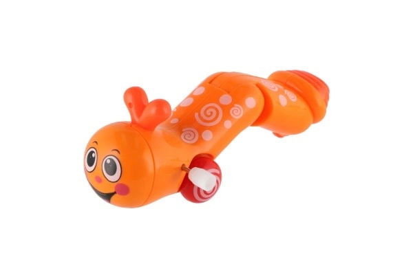 Plastičen plazilec, ki se navije, 13cm, 6 barv, 12 kosov v škatli